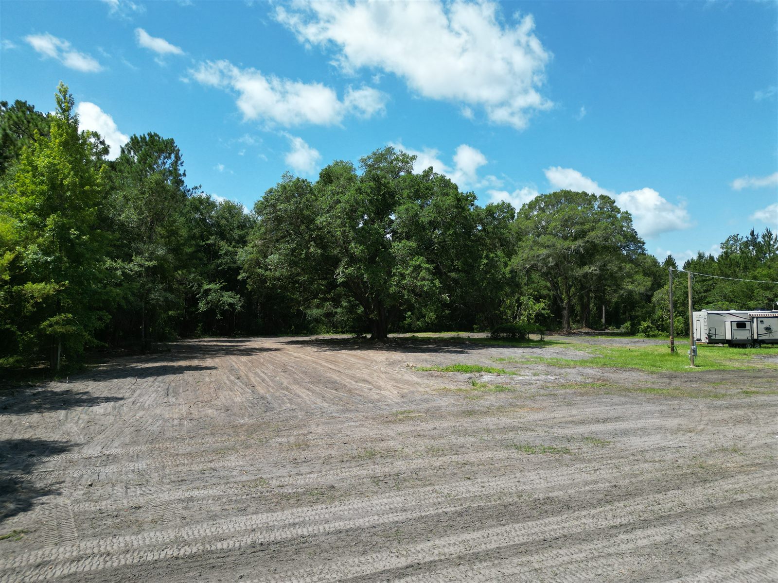 Dirt delivered and graded to level a field